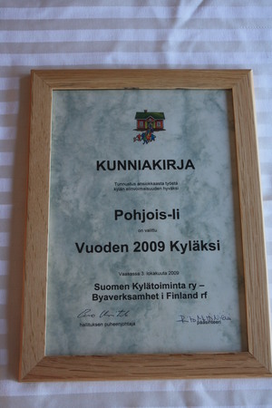 kunniakirja_valtakunnallinen_vuoden_kyla_2009.jpg